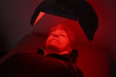 older woman red light therapy.jpeg
