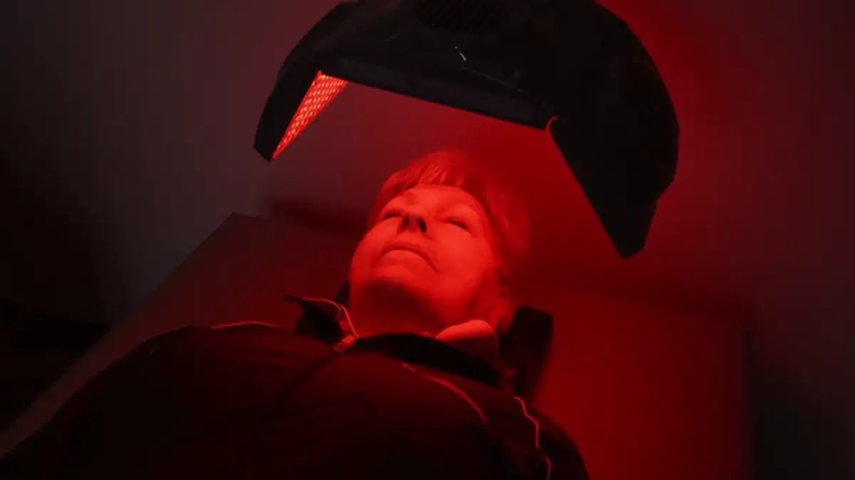 older woman red light therapy.jpeg