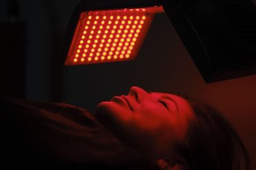woman doing red light therapy.jpg